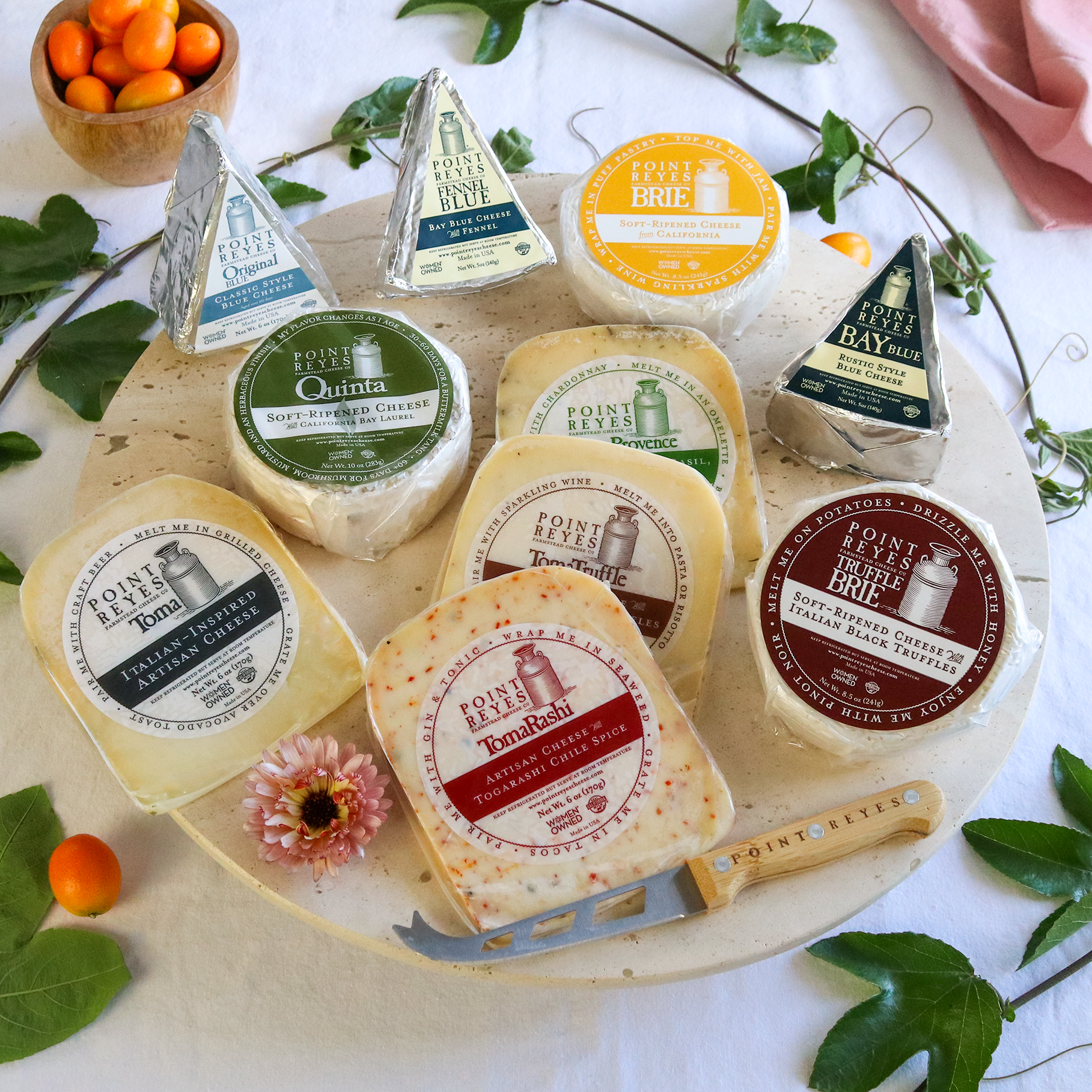 Bob's Big Cheese packaged on a round board