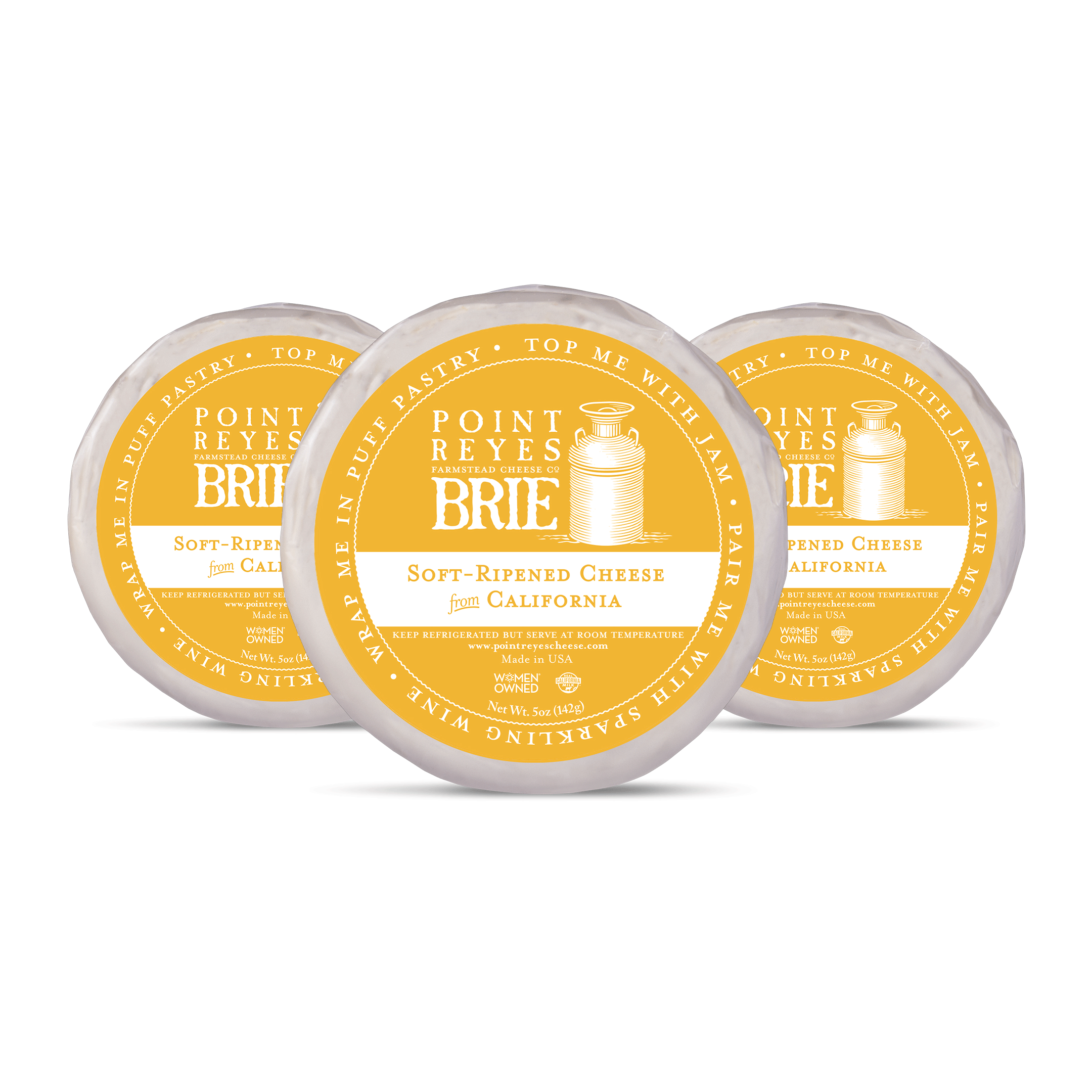 Three containers of Point Reyes Brie cheese on a white background