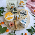 packaged taste of point reyes cheese pack on a round board