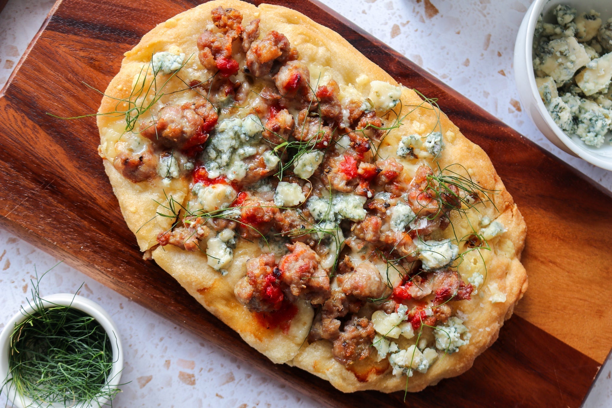 sausage flatbread on a board