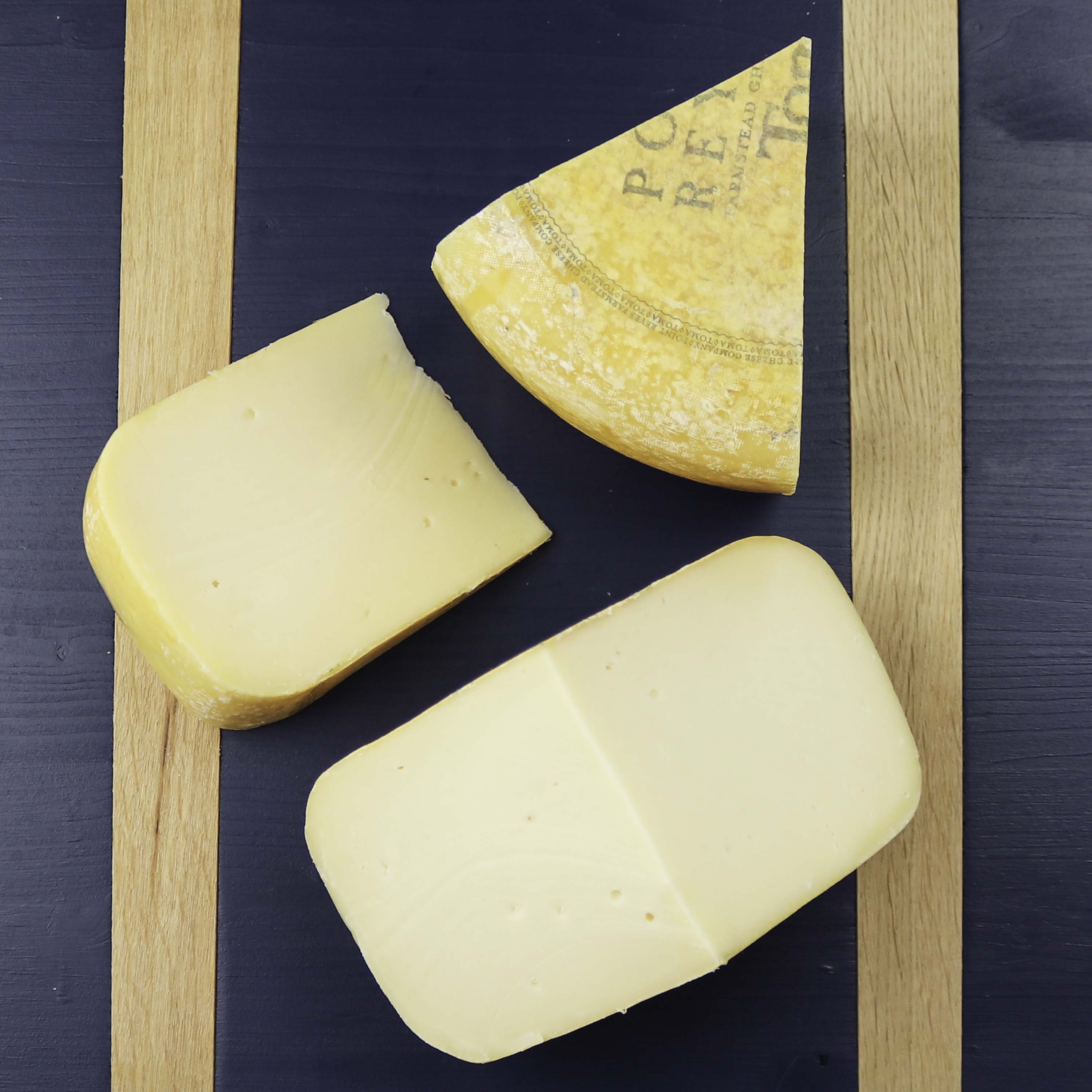 cut pieces of toma on a blue board