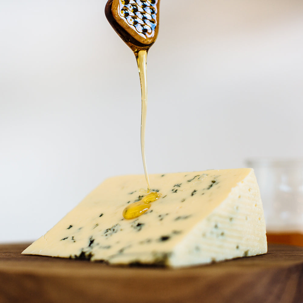 Original Blue being drizzled with honey
