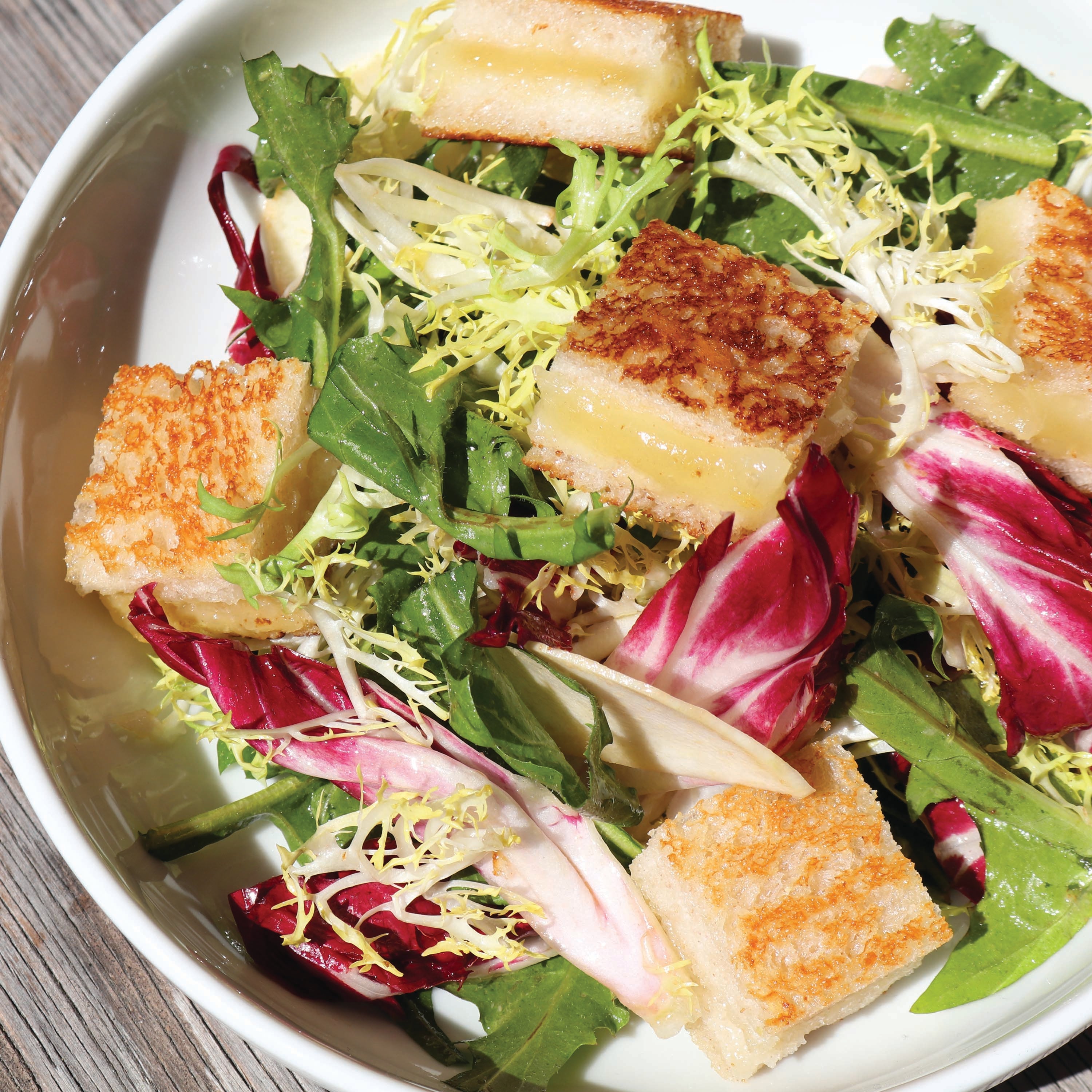 Bitter Greens with Anchovy Vinaigrette & Grilled Cheese Croutons