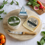 packaged farm fresh cheese pack on a round board