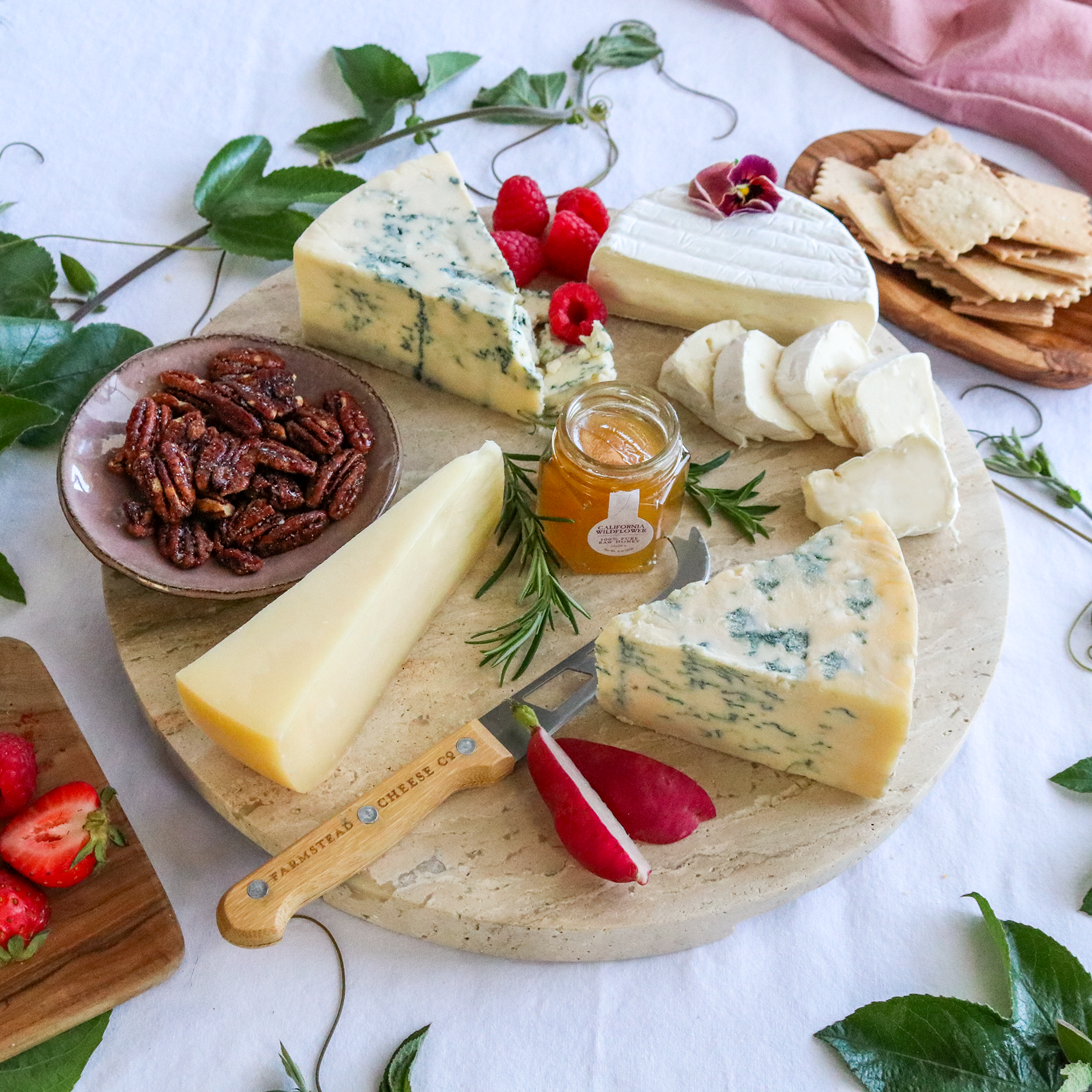Taste of Point Reyes cheese pack prepared on a round board