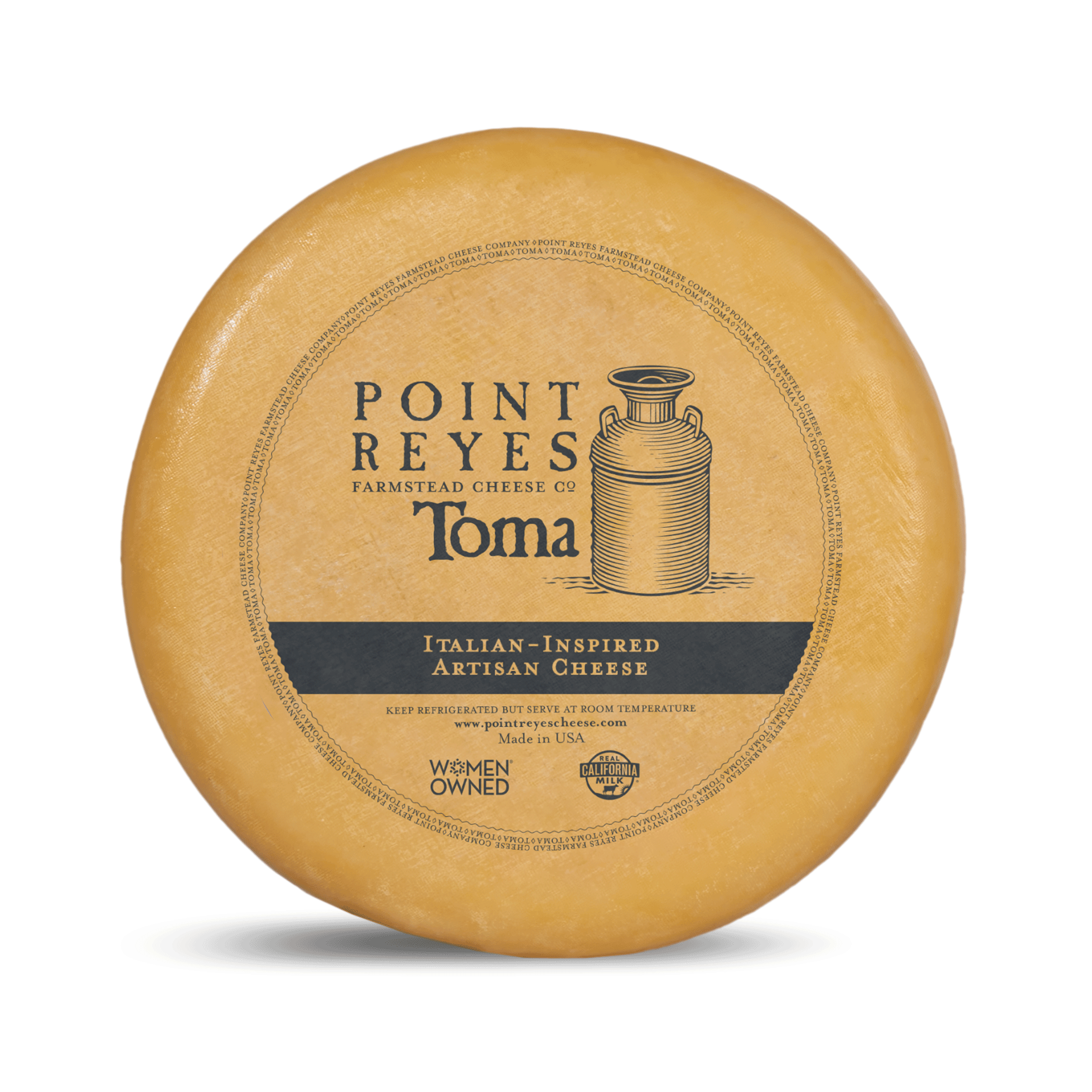 Point Reyes Toma cheese wheel on a white background