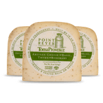 Three blocks of Point Reyes Toma Provèence artisan cheese with labels on a white background