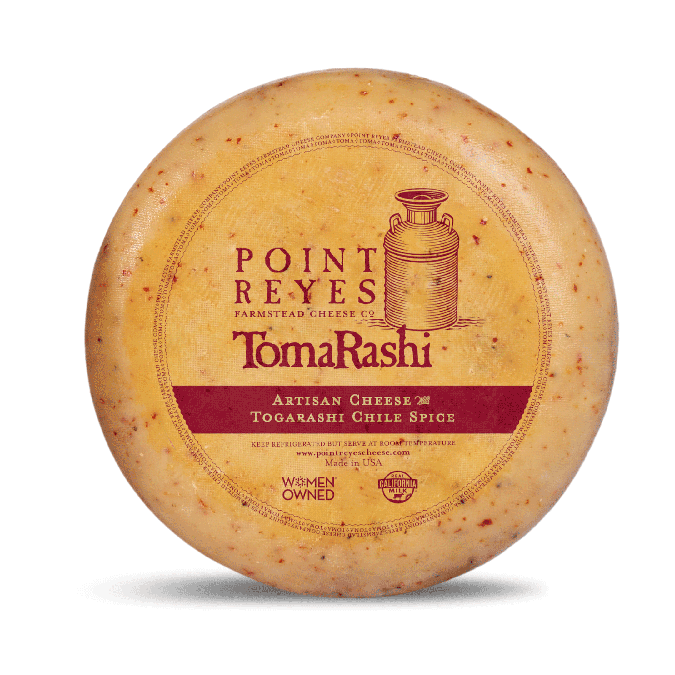 Point Reyes TomaRashi cheese wheel on a white background